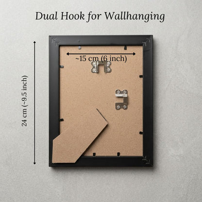 Black color photo frame with dual hooks for wall hanging on a gray background