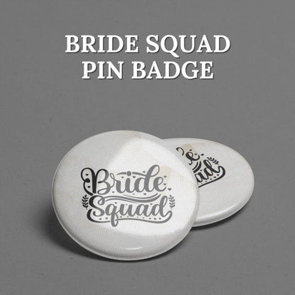 Two 'Bride Squad' pin badges with Ivory Pearl design, and kept on a gray background with text above.