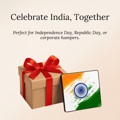 Gift box with red ribbon and a square fridge magnets featuring the Indian flag on a beige background.